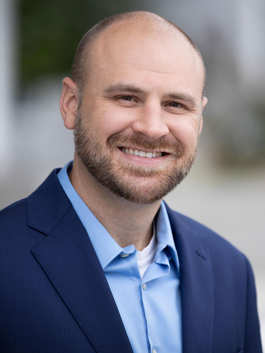 DEREK SCHMITZ