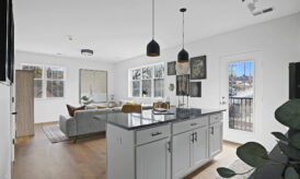 Dewey Park Apartments living area from kitchen thumbnail